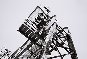 old railroad signal tower in black and white