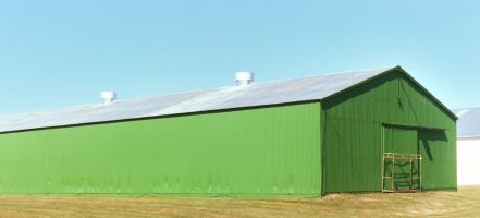 green metal barn